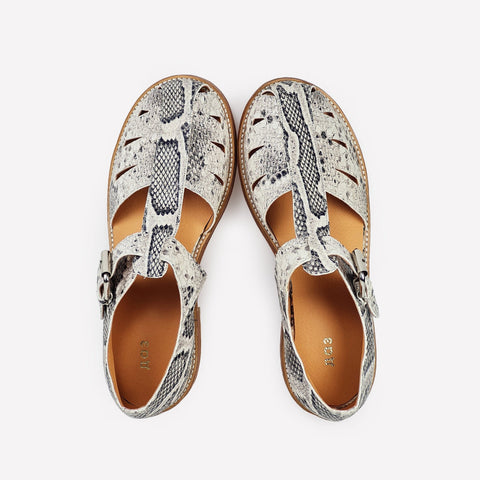4. Top view of Daz Studio handmade snake print sandals with leather insole and silver-tone buckle