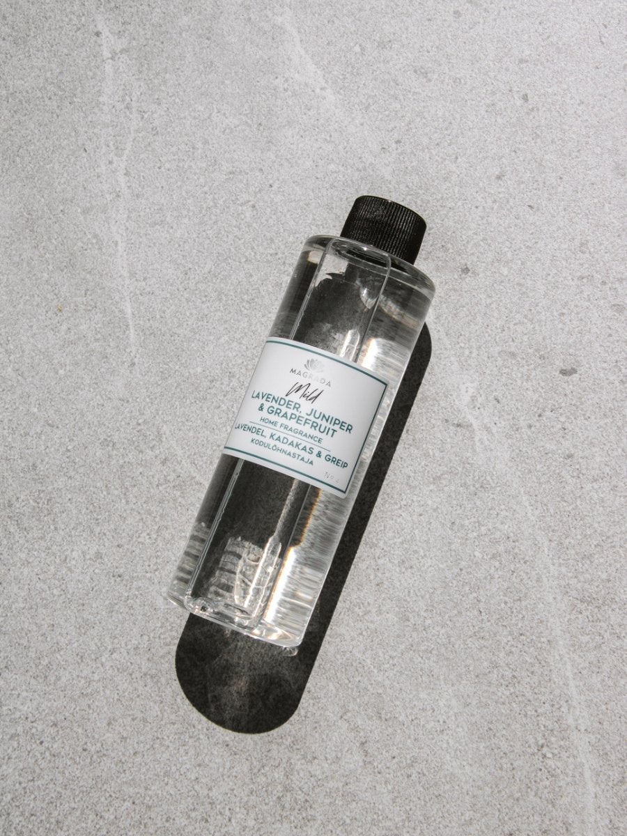 1. Magrada Organic Cosmetics Mild home fragrance refill bottle with lavender, juniper, and grapefruit scent, shown on a textured surface