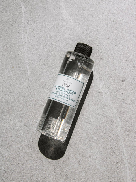 1. Magrada Organic Cosmetics Mild home fragrance refill bottle with lavender, juniper, and grapefruit scent, shown on a textured surface