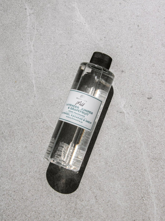 1. Magrada Organic Cosmetics Mild home fragrance refill bottle with lavender, juniper, and grapefruit scent, shown on a textured surface