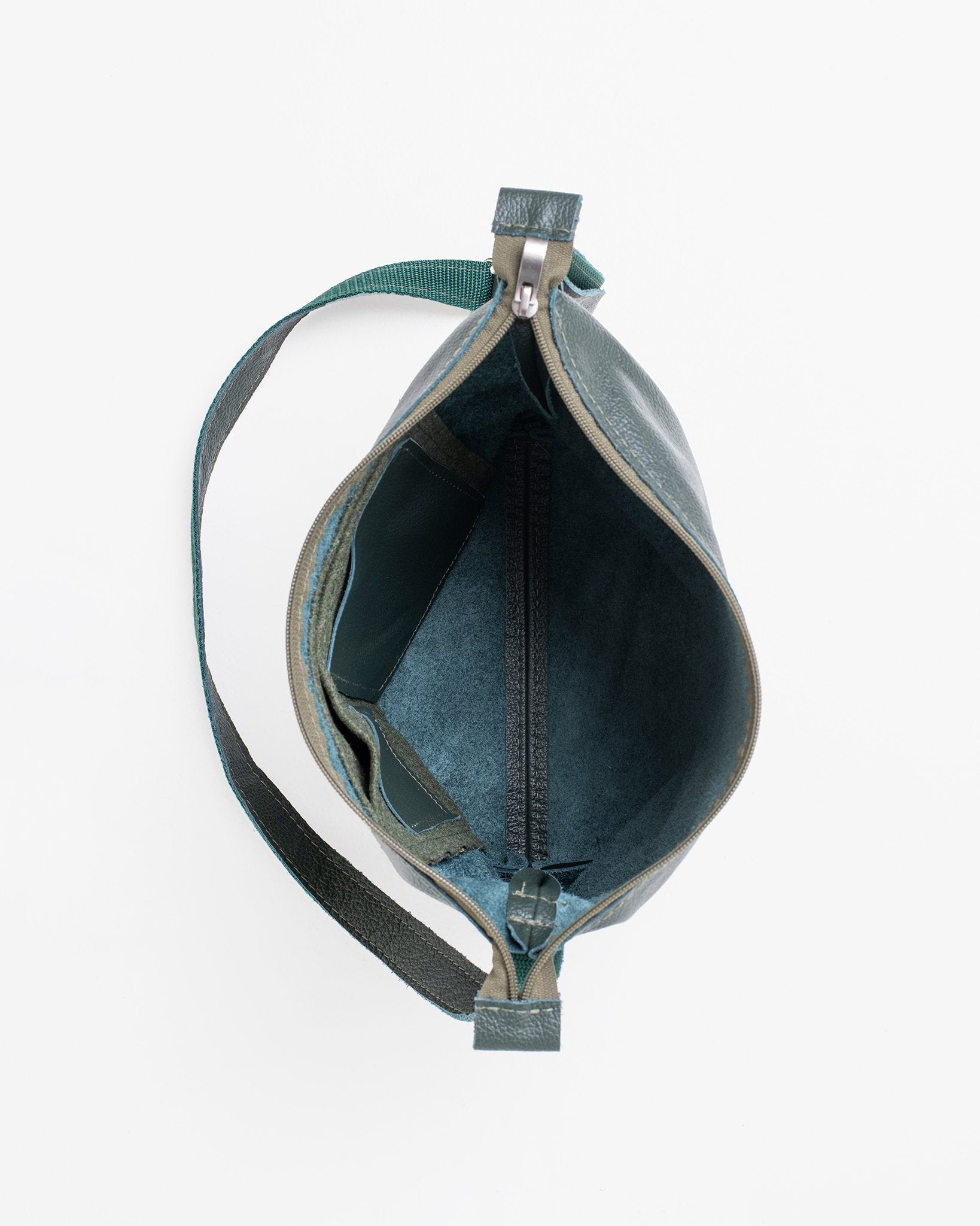 3. Interior view of Trendbag Anet L shoulder bag, showing zippered pocket and leather lining