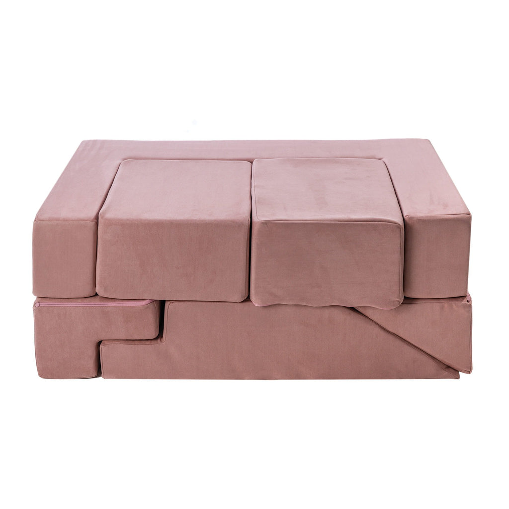 3. Pink velvet children's playground set stacked neatly in a compact form