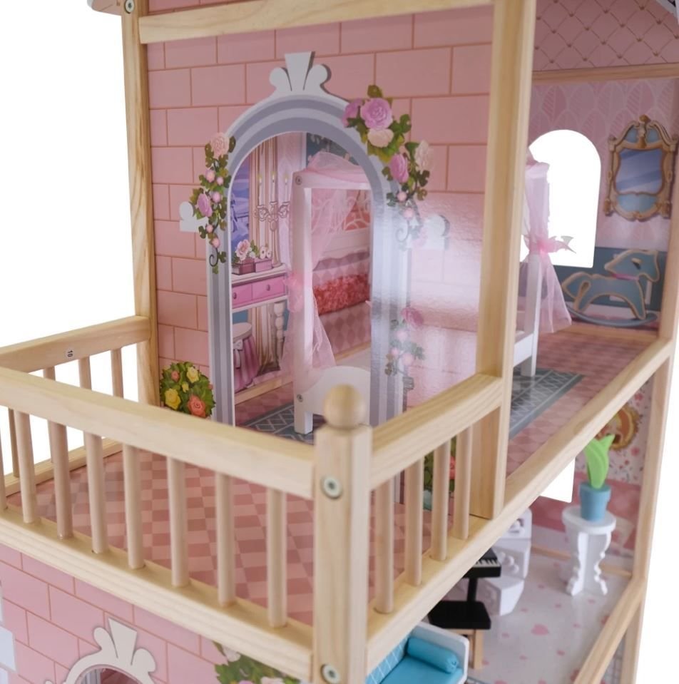 3. Close-up of the dollhouse's balcony and upper floor with floral archway and pink decor
