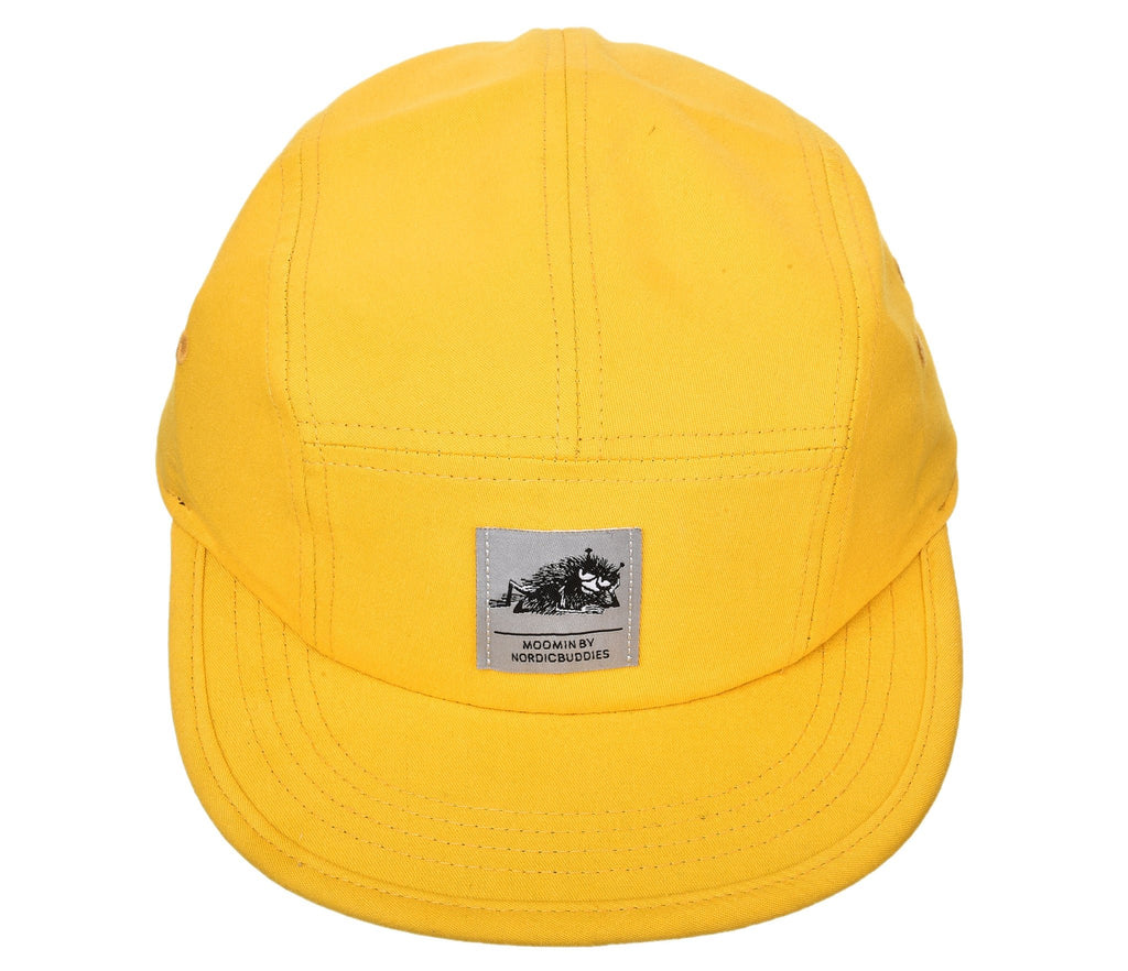 4. Front view of yellow Moomin by NordicBuddies five panel cap with logo, studio background