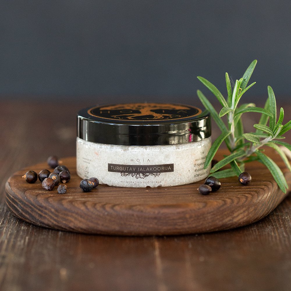 1. HOIA homespa Revitalizing Foot Scrub in 75ml jar, featuring natural exfoliants and essential oils, shown in studio setting