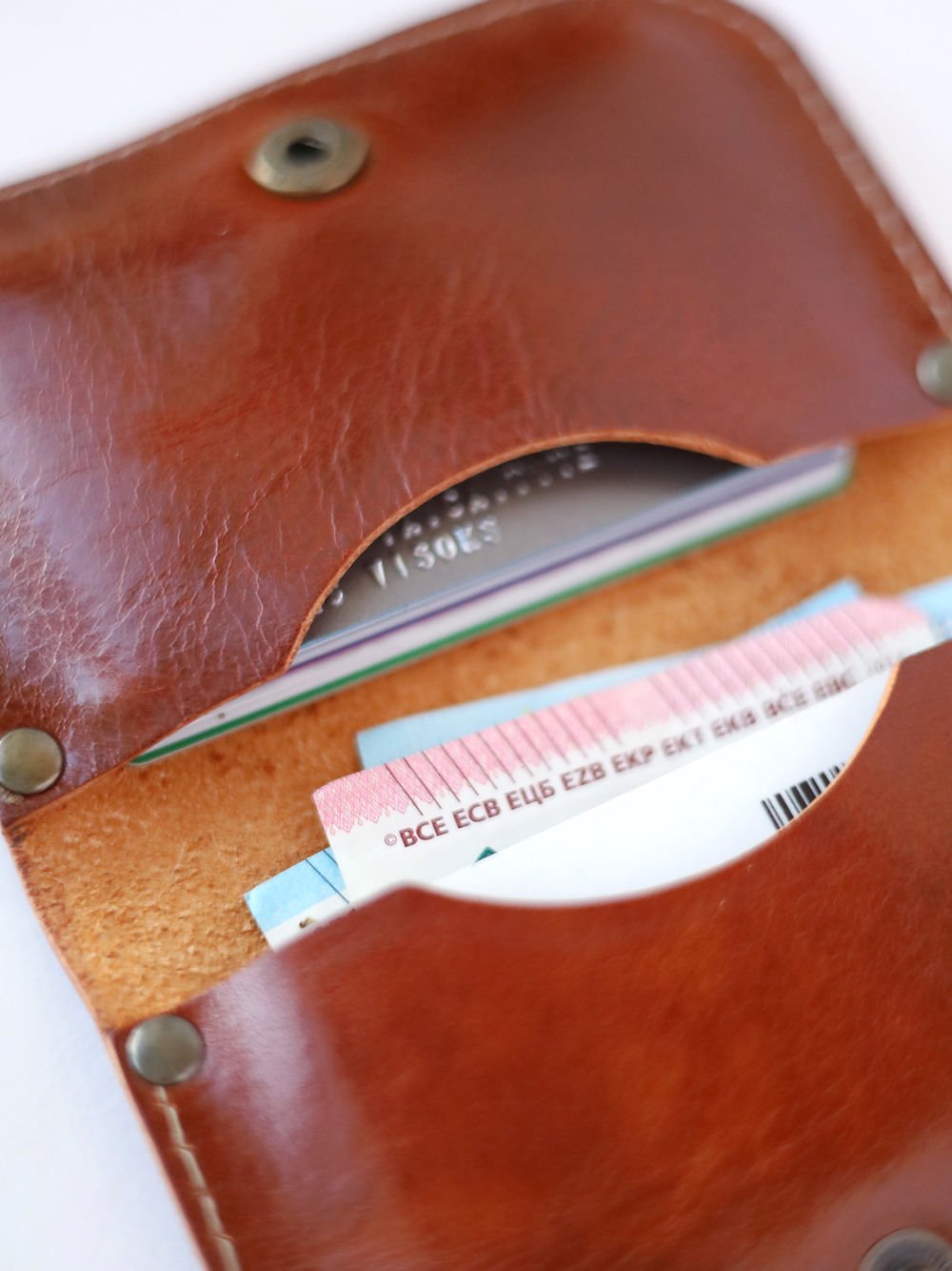 2. Close-up of SUNDAY Wallet in Shiny Ginger by TOKS VISOKS, displaying card and cash slots