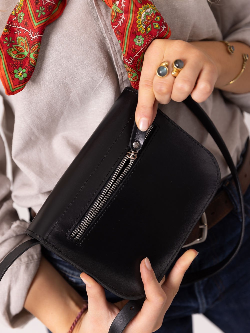 12. Close-up of black RUBY Purse by TOKS VISOKS with zipper, highlighting secure closure