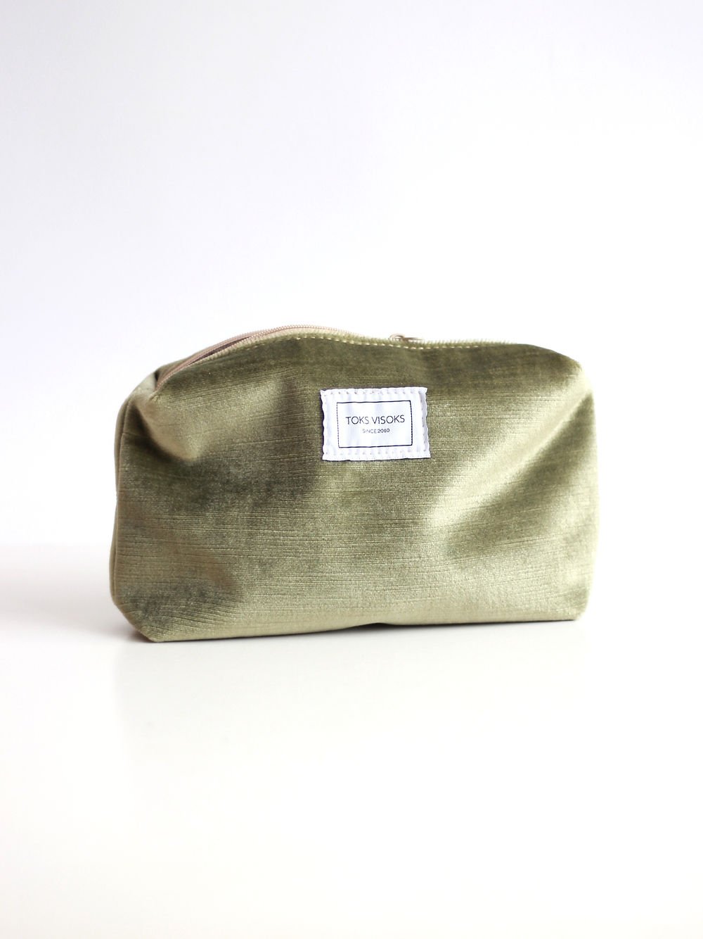 5. Studio shot of LORNA Makeup Bag in olive velvet by TOKS VISOKS, emphasizing eco-friendly material