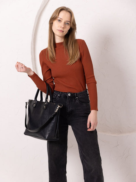 5. Women's MIGLE Leather Handbag in Dark Denim by TOKS VISOKS, held by handles in lifestyle setting