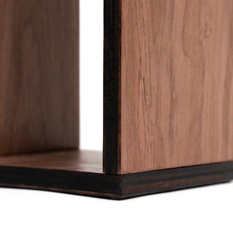 3. Detail of handcrafted birch plywood base of toilet paper holder, showing wood grain