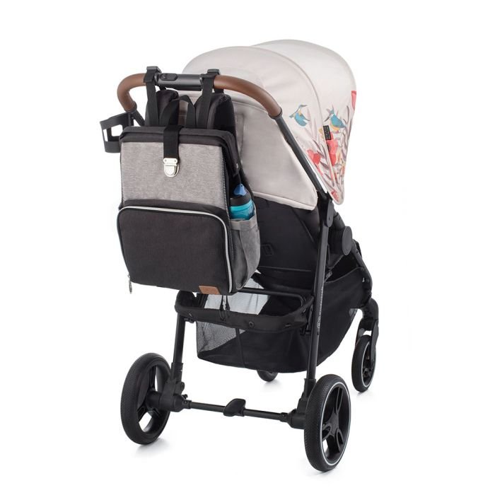2. Kinderkraft Molly diaper backpack attached to stroller handle, showing versatility and storage