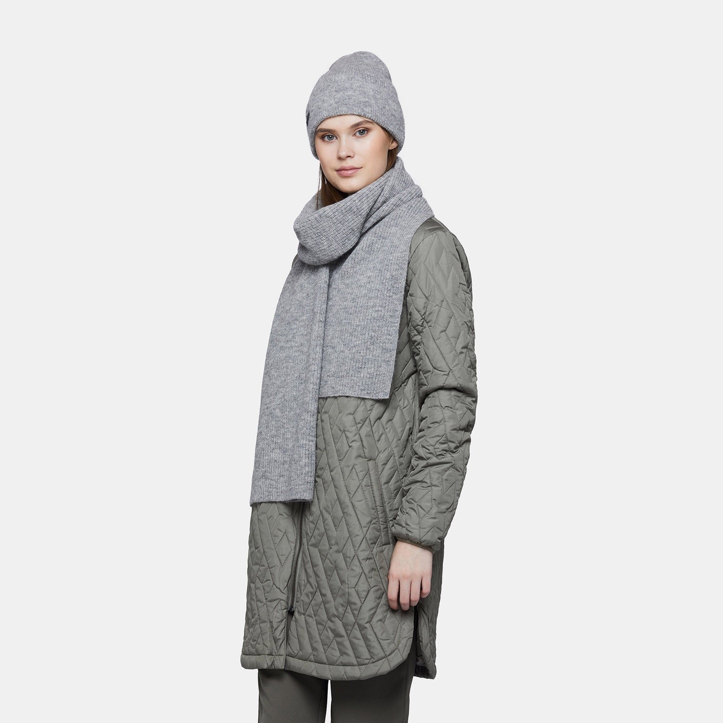 8. Women's silver Alpaka Fisherman's Rib scarf and hat set in studio setting
