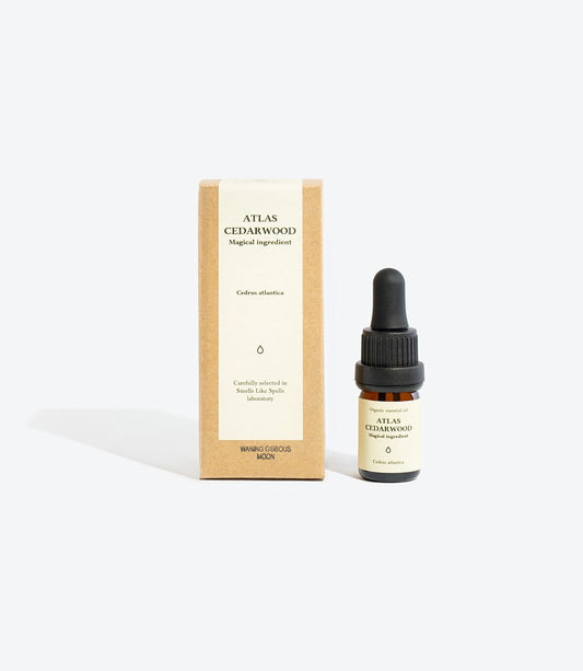1. Smells Like Spells ATLAS CEDARWOOD essential oil with packaging, featuring 5 ml glass bottle and eco-friendly box