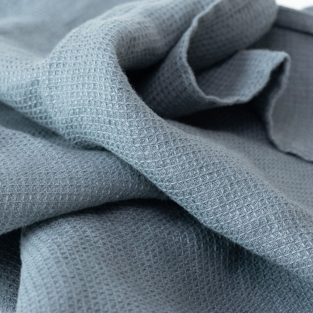 5. Close-up of blue fog linen fine waffle towel texture highlighting intricate pattern