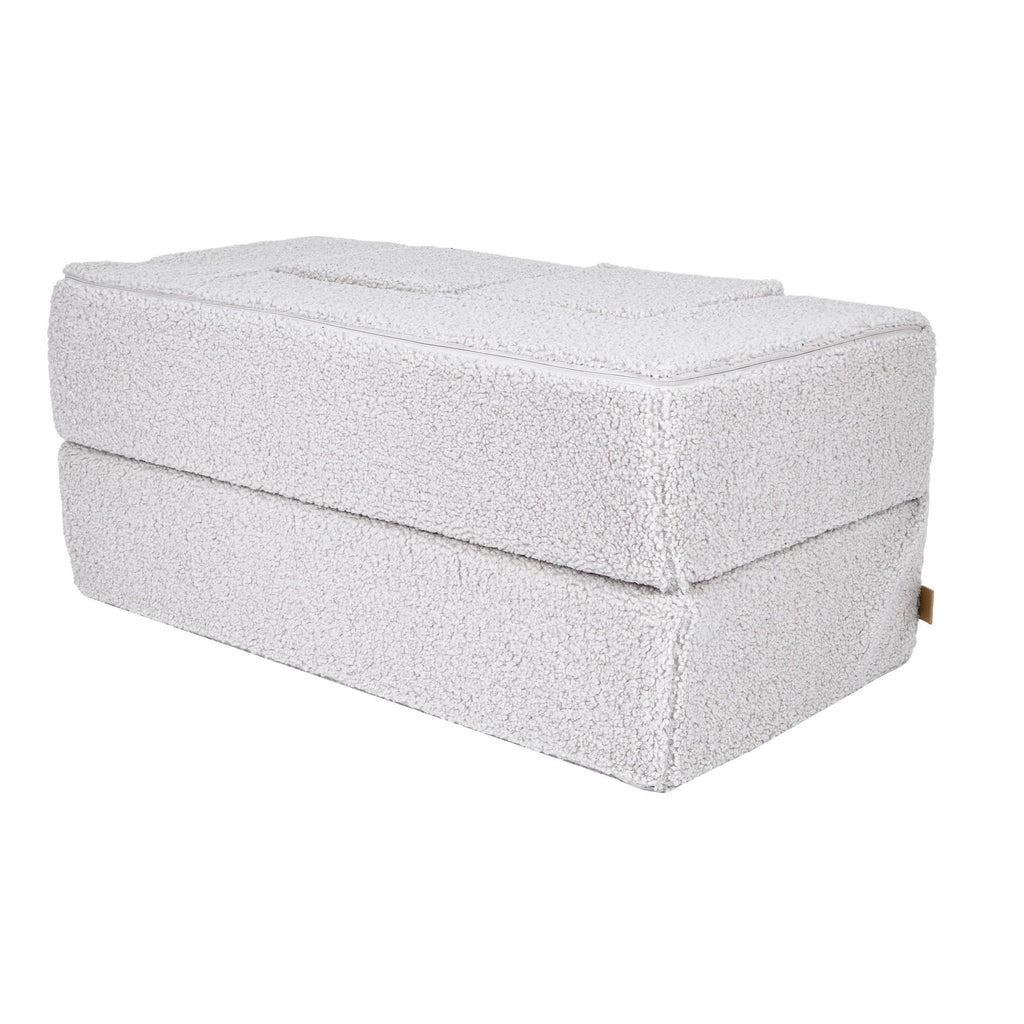 3. Side view of MeowBaby children's white foam sofa folded into a compact shape