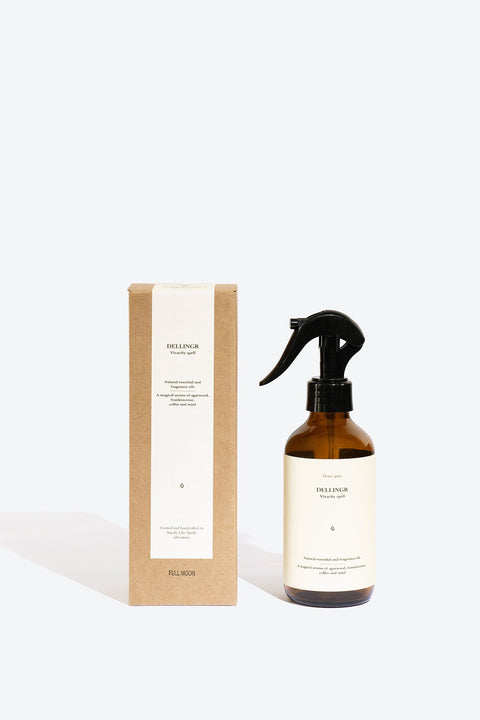 2. Smells Like Spells DELLINGR home spray with packaging, showcasing recyclable design, studio setting