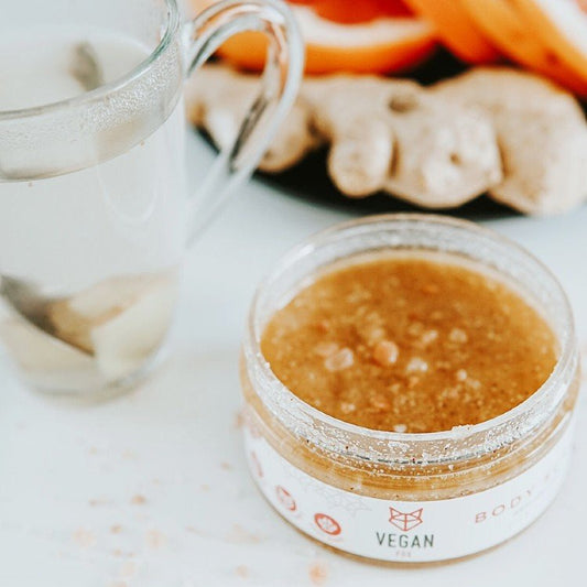 2. Vegan Fox Anti-cellulite Body Scrub Ginger, 300g, in sunlight with green leaves