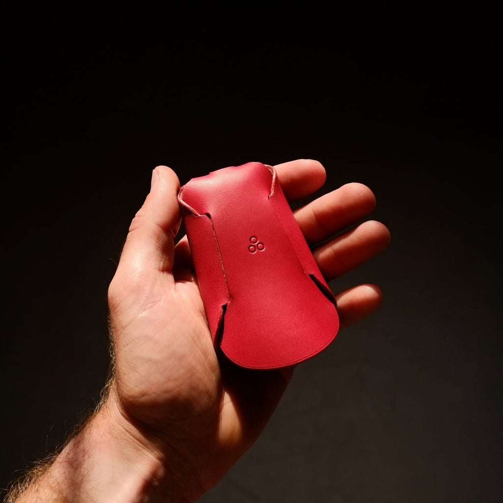 3. Back view of Mirgoods red folded keyholder, showing unique one-piece construction