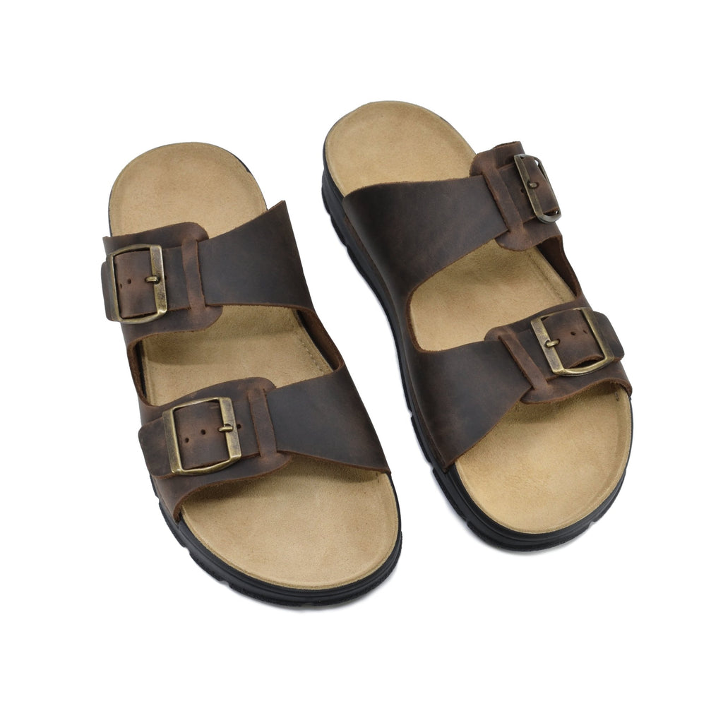 2. Top view of Omaking Märt v2 dark brown leather sandals with two adjustable buckles, studio shot