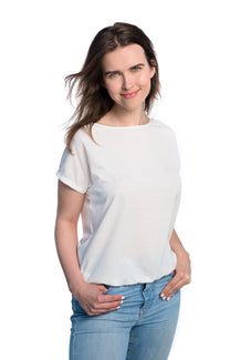 4. Front view of women's white Tan-Through T-Shirt by Smarttan in studio setting