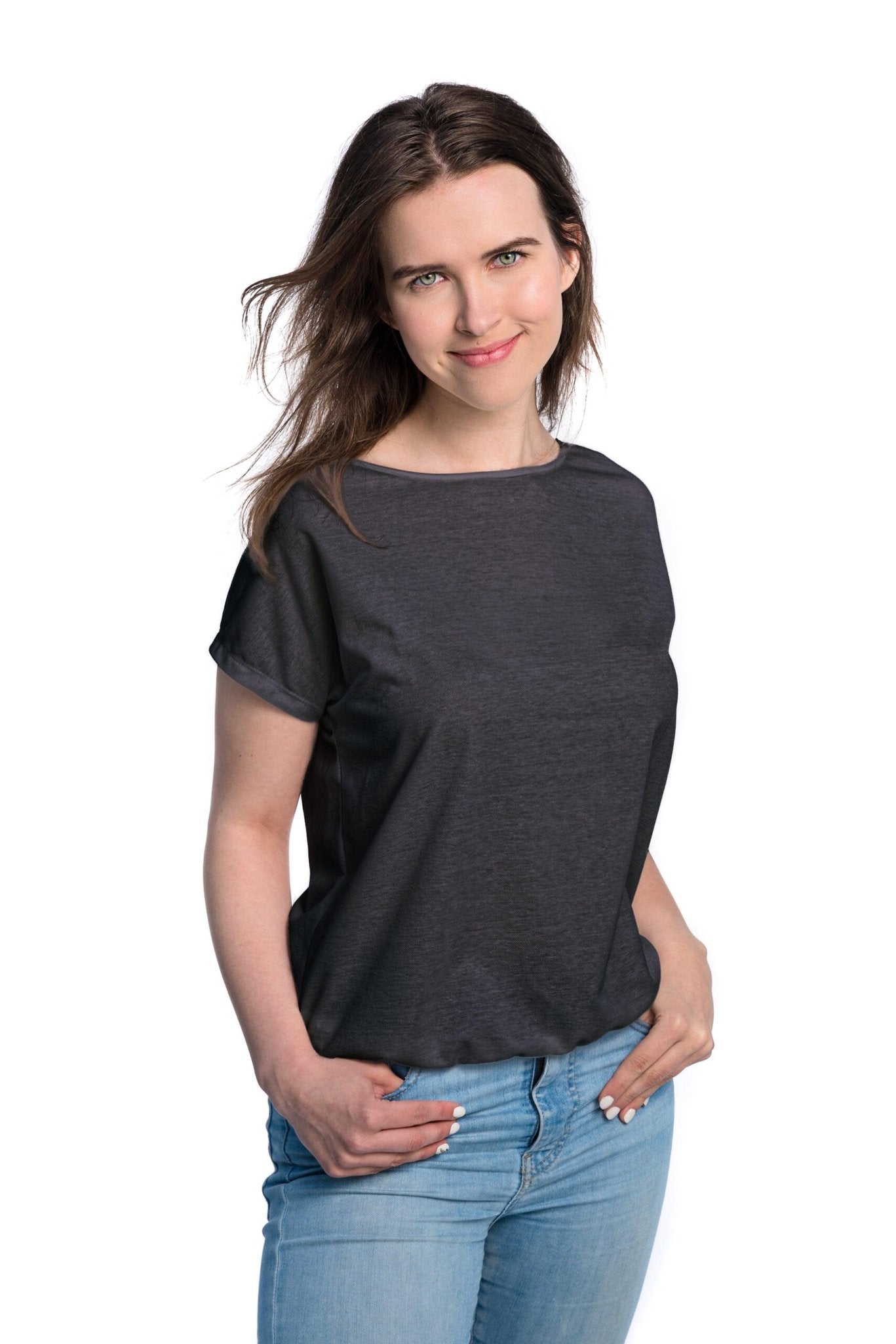 1. Women's dark grey tan-through t-shirt by Smarttan, shown in studio setting, highlighting breathable fabric and relaxed fit