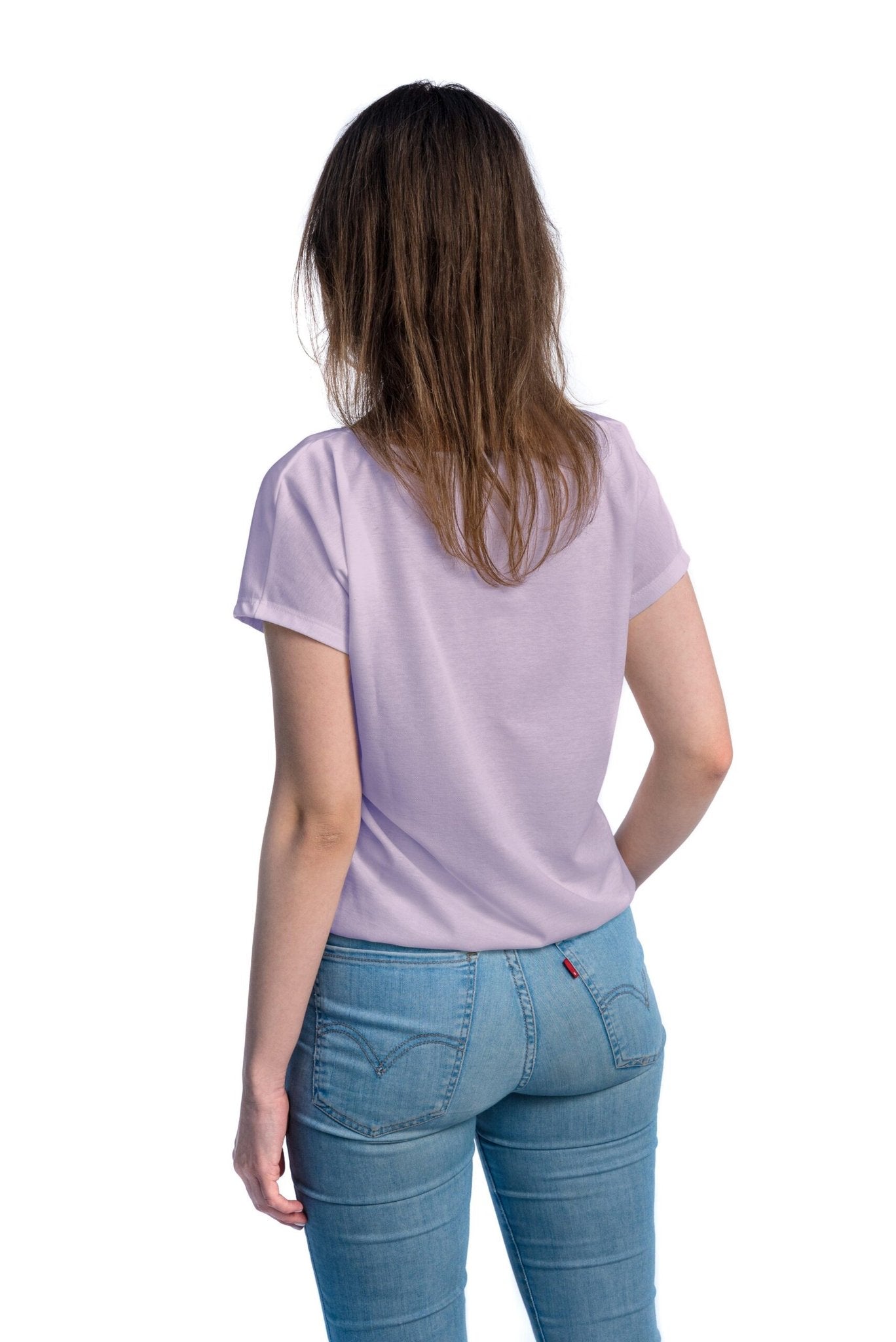 1. Women's tan-through t-shirt in lavendel by Smarttan, shown from the back, highlighting comfortable fit and elastic band