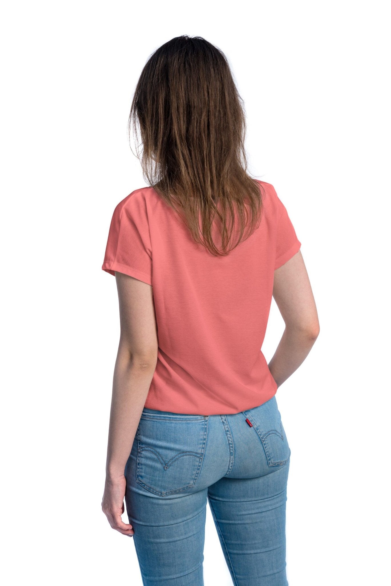 4. Back view of woman wearing Smarttan Tan-Through T-Shirt in coral, highlighting elastic band and fit