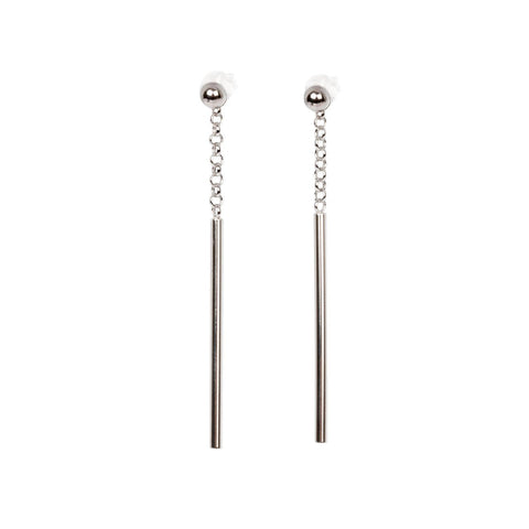 3. Close-up of MyaMoon Dots Falling earrings in sterling silver with chain and bar design on white background