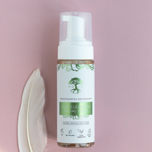 1. HOIA homespa Deep Cleansing Facial Foam with juniper and sage, shown on pink background with feather