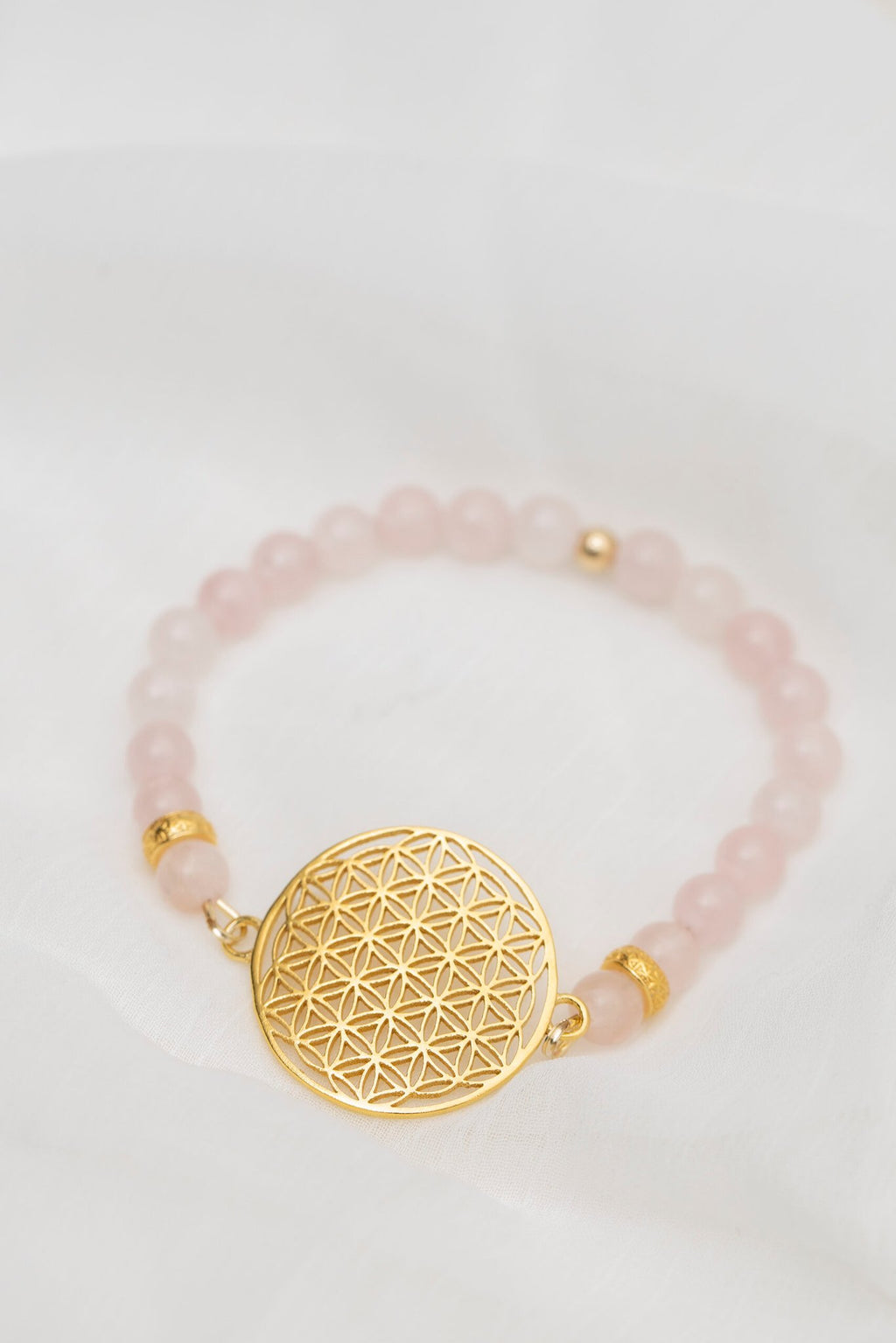 1. Flower Of Life bracelet in rose quartz with gold plated silver charm, handmade by New Vintage by Kriss