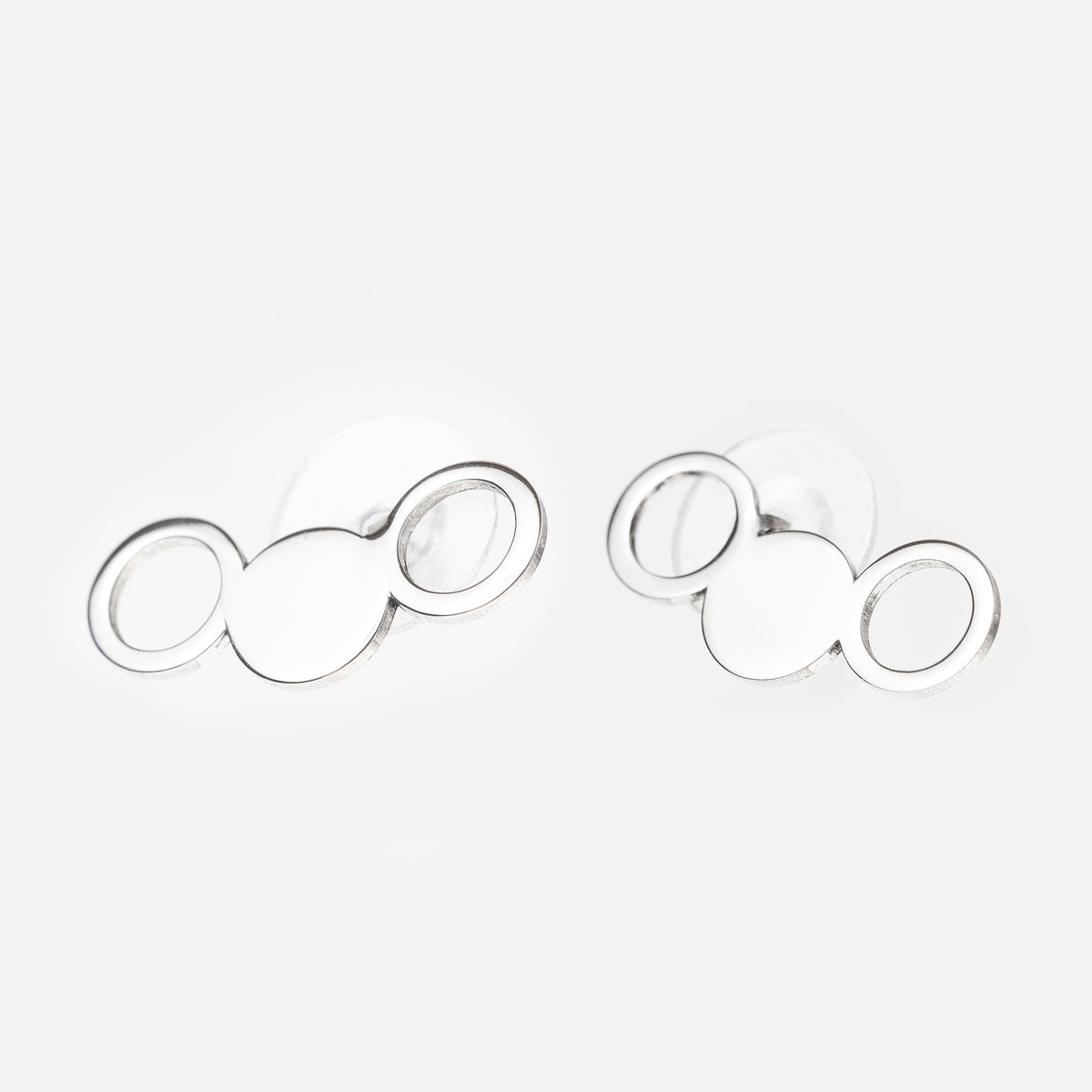 3. Studio shot of Lentsius Silva stainless steel earrings with circular design