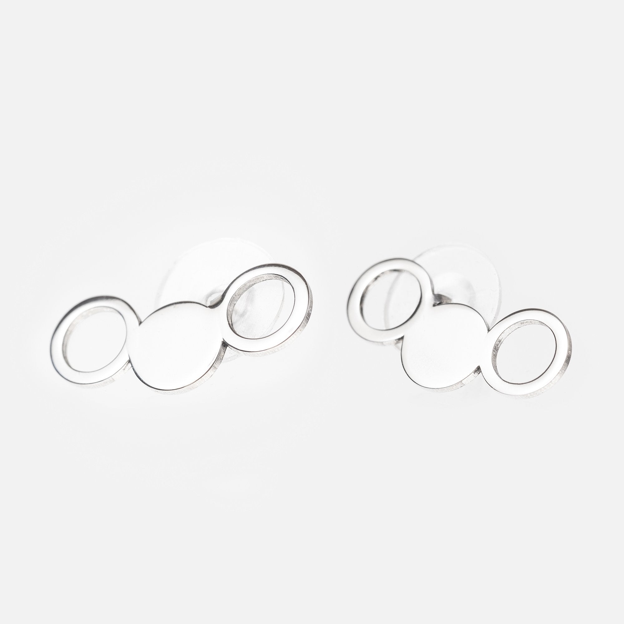 3. Studio shot of Lentsius Silva stainless steel earrings with circular design