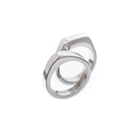 4. Close-up of Lentsius Twins rings in polished stainless steel, studio shot