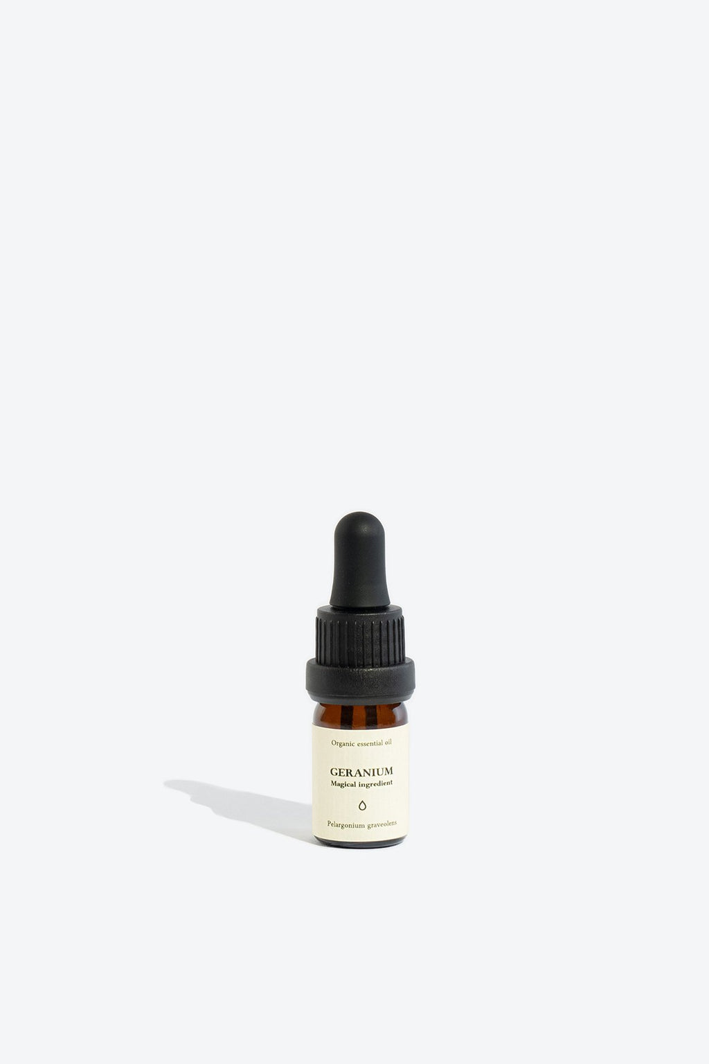 3. Smells Like Spells GERANIUM Essential Oil in 5 ml glass bottle, studio setting