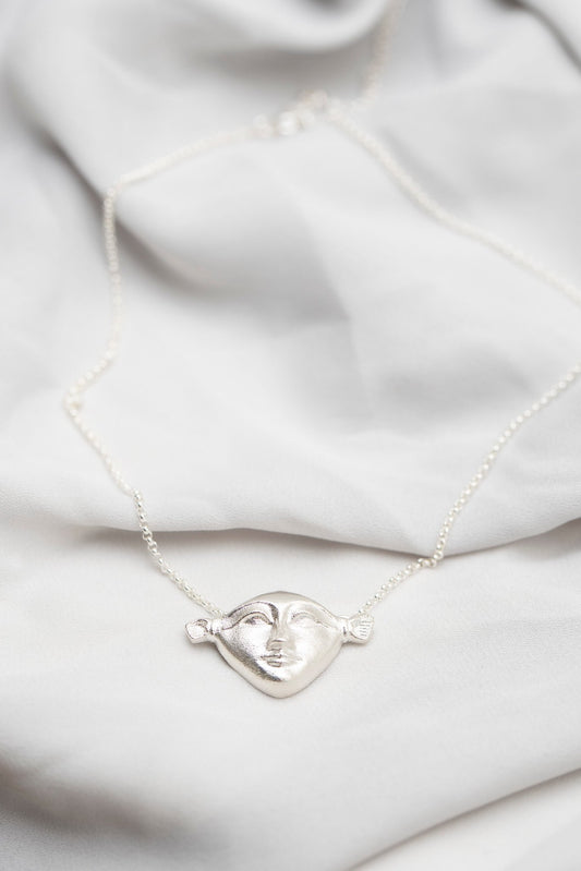 2. Hathor Harmony Choker in silver by New Vintage by Kriss, displayed on soft fabric