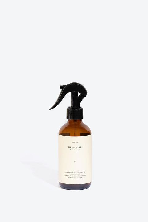 3. Smells Like Spells Heimdallr perfumed home spray in amber bottle, shown in studio setting