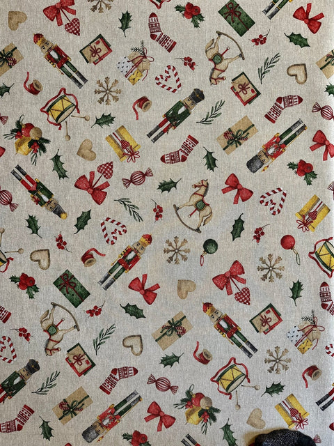 4. Flat lay of Festive Motive Christmas Story tablecloth featuring Christmas-themed print by Hortensias Home