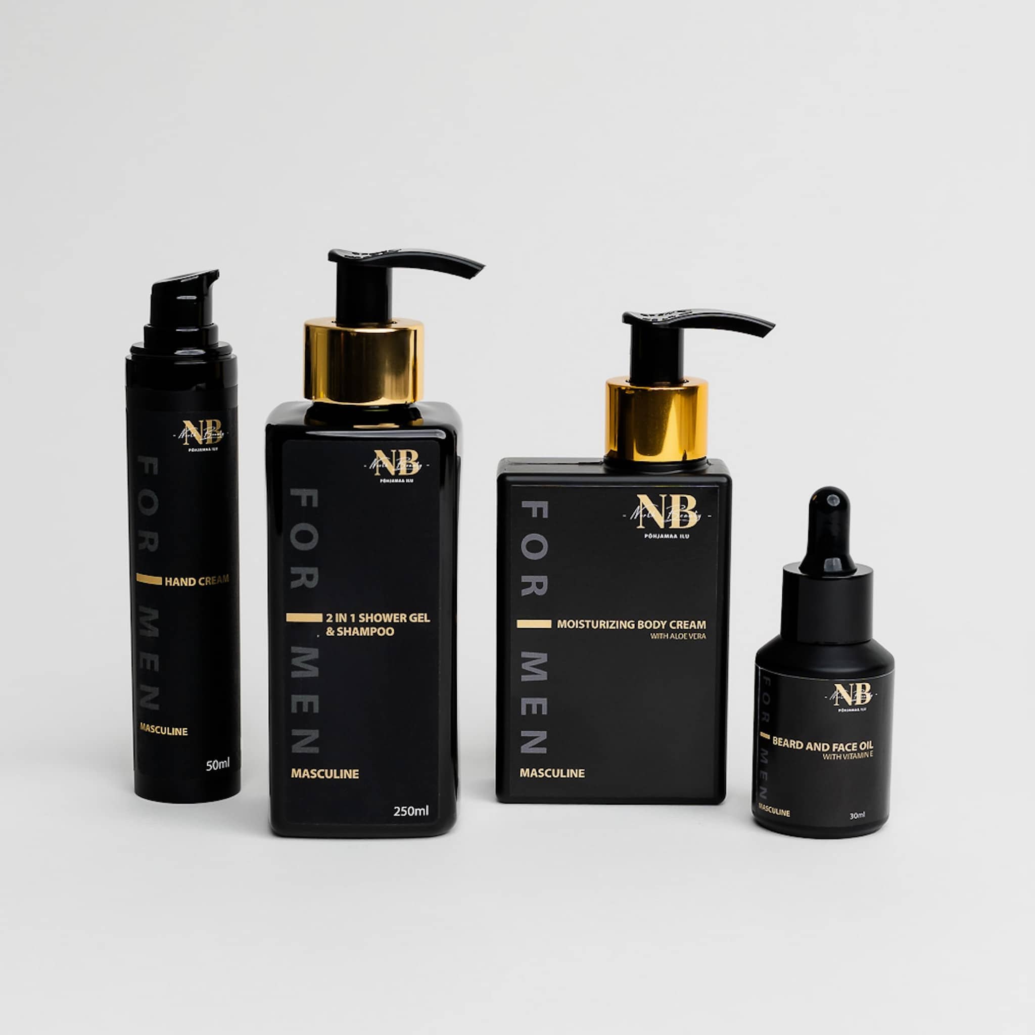 2. North Beauty men's grooming set featuring face and beard oil, shower gel, body cream, and hand cream in studio setting