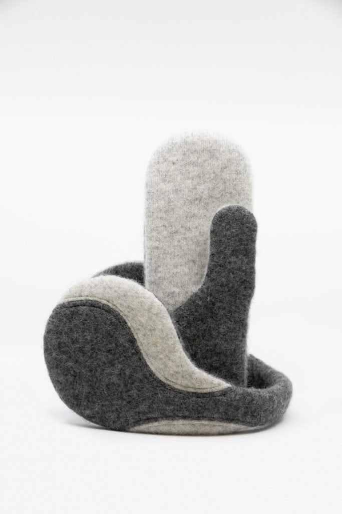 2. Close-up of HERTTA felted wool mittens in medium grey and lightest grey, emphasizing texture and design