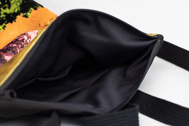 9. Interior view of Muni Bold Mountains backpack showing black lining and spacious design