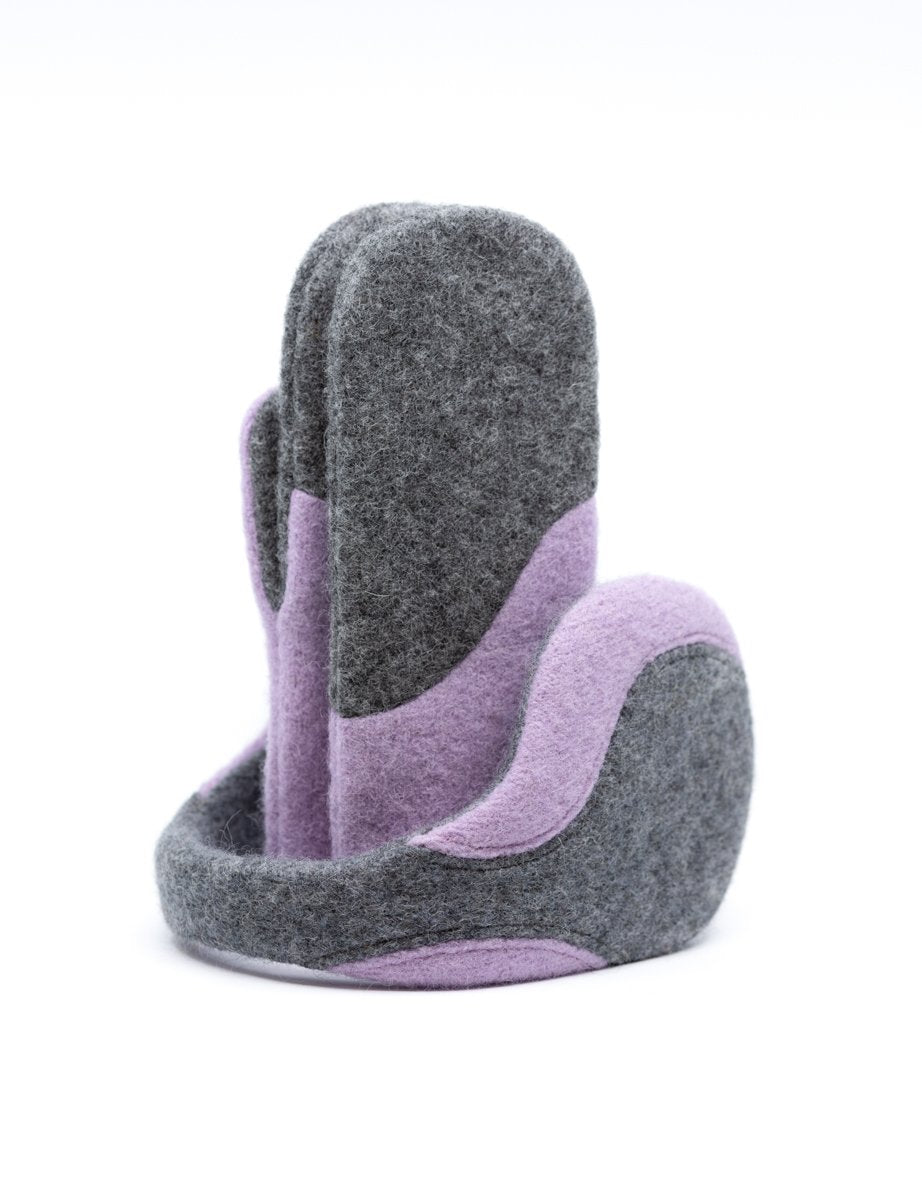 1. Women's felted wool mittens in medium grey and lilac by HERTTA, shown in studio setting