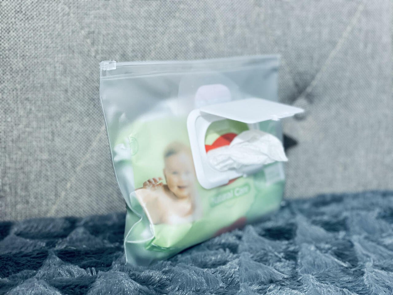 9. Side view of wet wipes pocket in use, demonstrating functionality and convenience for Ally Scandic handbag