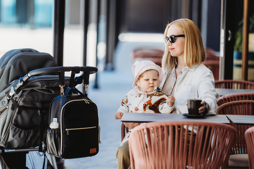 19. Pair of Ally Scandic Small Espresso Diaper Backpacks in studio setting