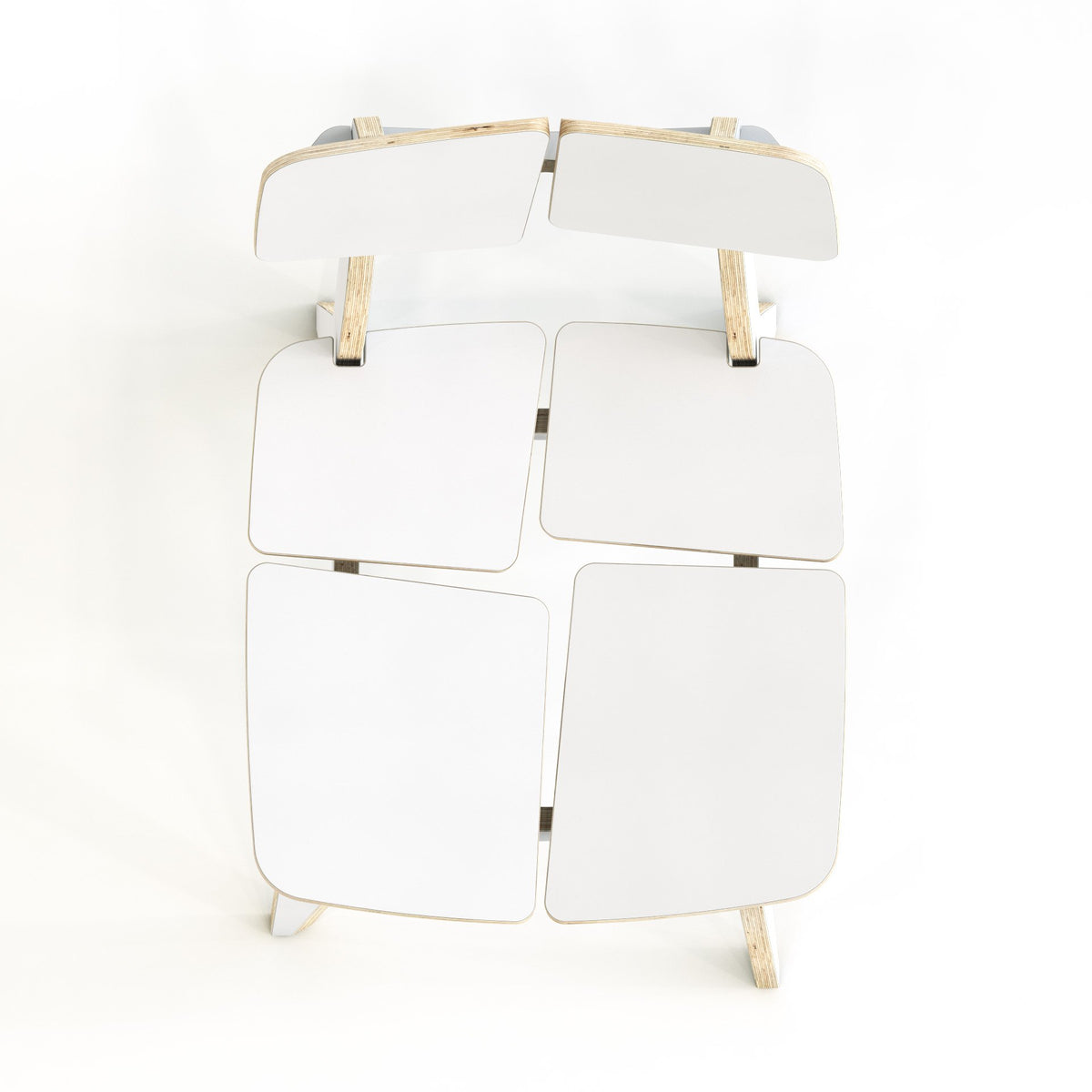 4. Top view of white Woodpecker dining chair, showing the laminated plywood seat and backrest design