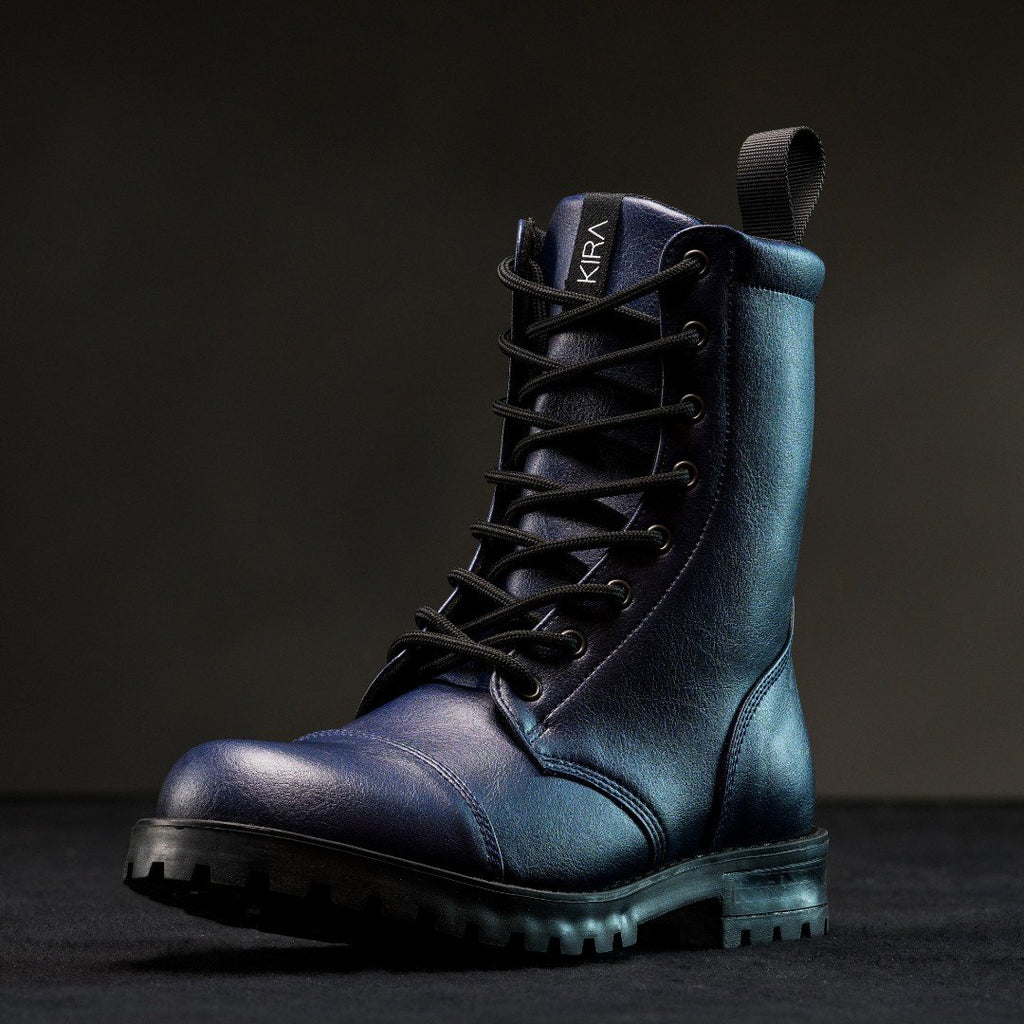 2. KIRA 6.0 sustainable blue boots with leather-like finish and deep tread sole, studio shot