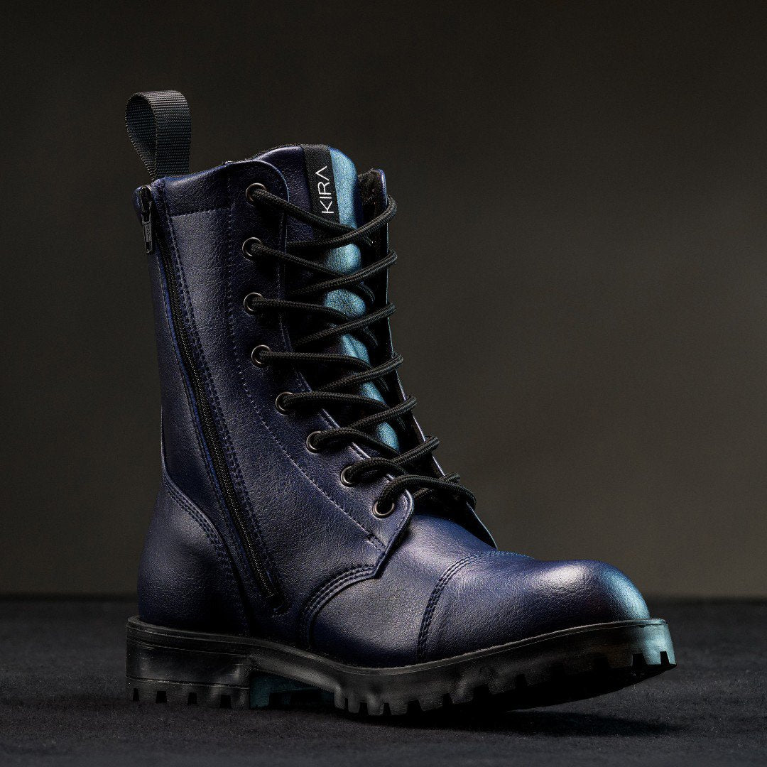 1. KIRA 6.0 blue vegan-friendly boots with side zipper and durable rubber sole, shown in studio setting