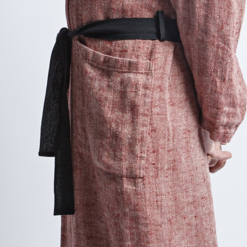 8. Side detail of pocket and black belt on red fishbone pattern linen bathrobe