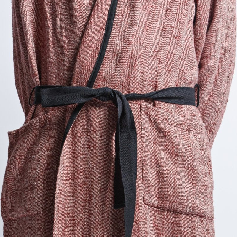 6. Close-up of black belt and pocket detail on red fishbone pattern linen bathrobe