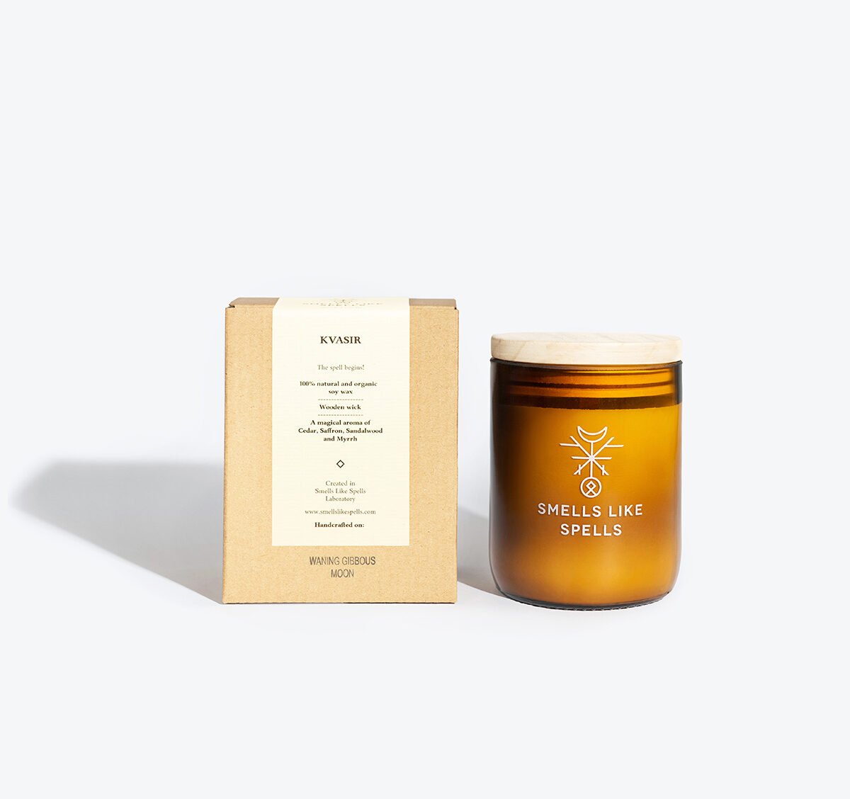 2. Smells Like Spells Scented Candle KVASIR with packaging, featuring amber glass jar and wooden lid