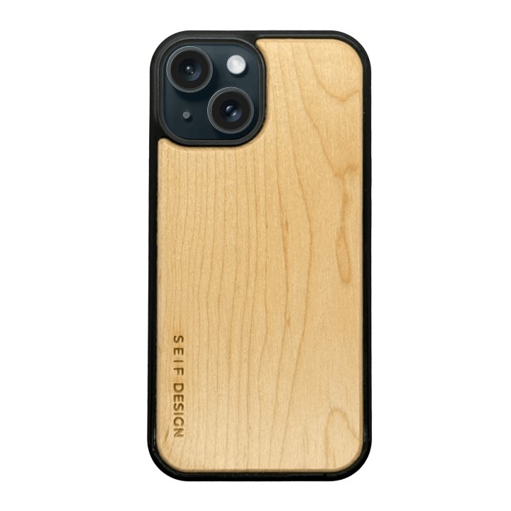 2. Birch wooden iPhone cover by Seif Design with precision cutouts, shown on black background, featuring engraved brand name on lower left corner